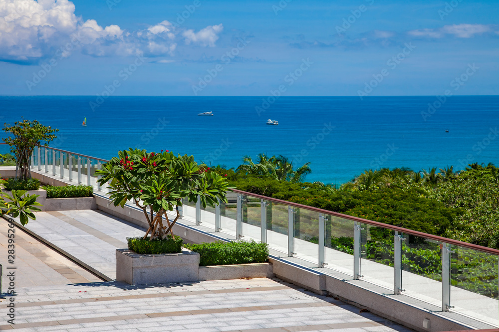 Sea View Hotel with Green Foliage and Blue Sky Sea View Hotel with Green Foliage and Blue Sky
