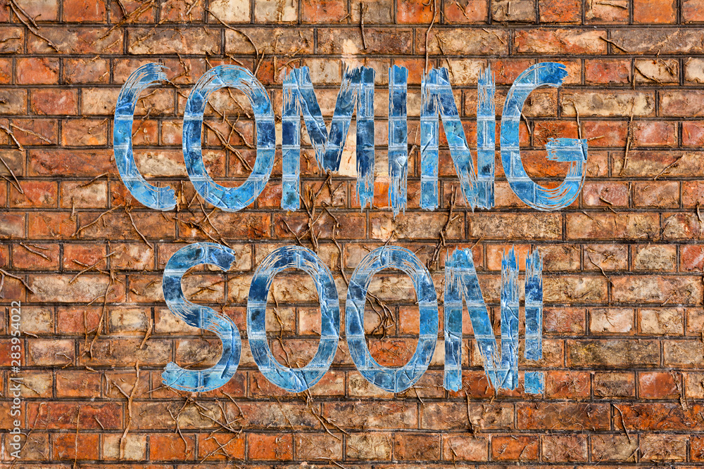 Conceptual hand writing showing Coming Soon. Concept meaning event or action that will happen after really short time Brick Wall art like Graffiti motivational call written on the wall Conceptual hand writing showing Coming Soon. Concept meaning event or action that will happen after really short time Brick Wall art like Graffiti motivational call written on the wall