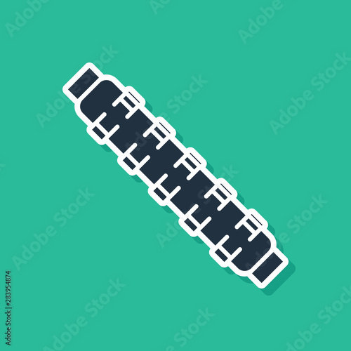 Blue Hunting cartridge belt with cartridges icon isolated on green background. Bandolier sign. Hunter equipment, armament. Vector Illustration