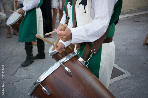 Close Up of Man Playing Drum at Medieval Village Festival