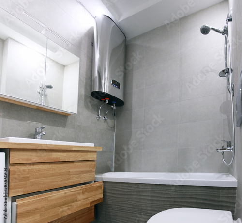 minimalist style bathroom interior with wooden oak bedside table boller, Scandinavian motifs,