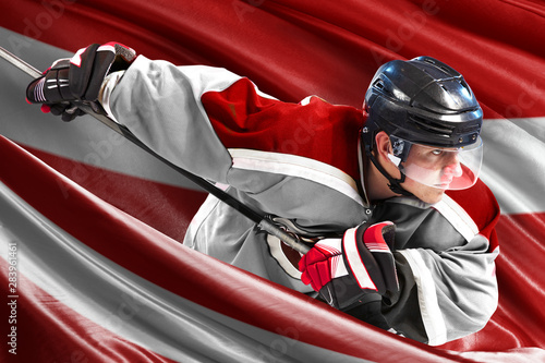 Latvia Hockey Player in action around national flags