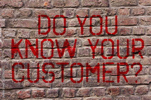 Writing note showing Do You Know Your Customer Question. Business concept for service identify clients with relevant information Brick Wall art like Graffiti motivational call written on the wall
