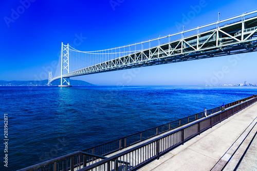 Landscape of family angler in the background of Akashi Kaikyo Bridge in the summer morning