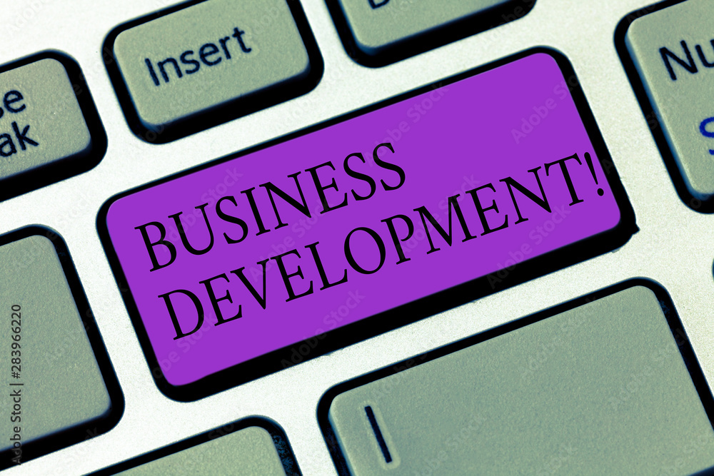 Conceptual hand writing showing Business Development. Business photo showcasing Develop and Implement Organization Growth Opportunities Keyboard key Intention to create computer message idea Conceptual hand writing showing Business Development. Business photo showcasing Develop and Implement Organization Growth Opportunities Keyboard key Intention to create computer message idea