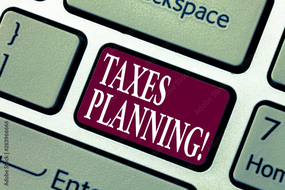 Conceptual hand writing showing Taxes Planning. Business photo showcasing Financial Planning Taxation Business Payments Prepared Keyboard key Intention to create computer message idea Conceptual hand writing showing Taxes Planning. Business photo showcasing Financial Planning Taxation Business Payments Prepared Keyboard key Intention to create computer message idea