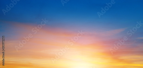 Sky and bright sun rise over the horizon. Wide photo . © alinamd