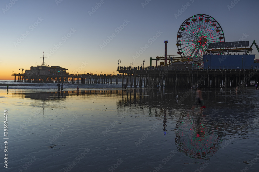 Image of the ferris wheel at the Santa Monica Pier at Twilight. 