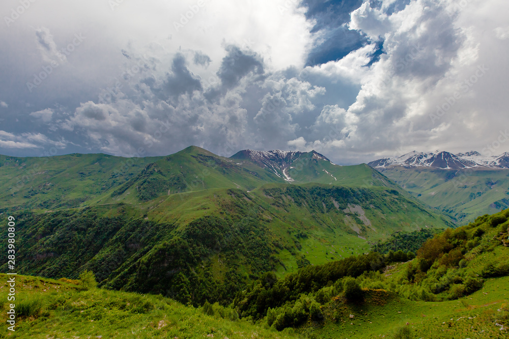 Mountains rocks landscape with cloudy dramatic sky Mountains rocks landscape with cloudy dramatic sky