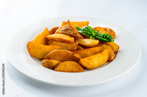 rustic french fries slices on a light background