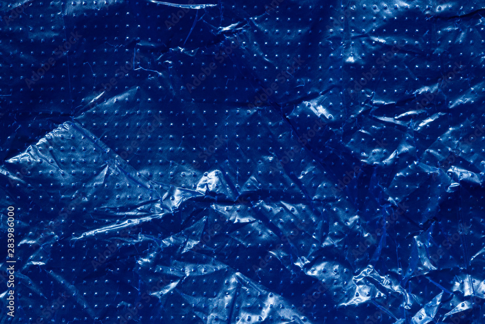Naklejka premium Blue Plastic Bag Closeup Macro
