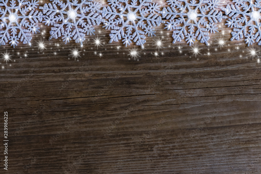 Snowflakes on old wooden background, Christmas and new year winter holidays Concept - obrazy, fototapety, plakaty 