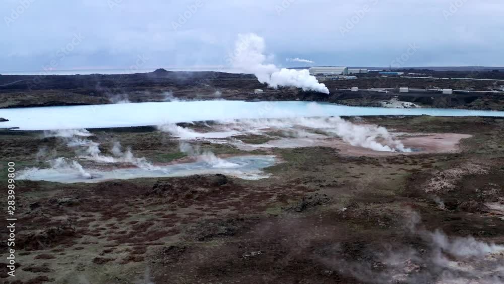 Aerial, view of a turquoise lake with very evident geothermal activity Aerial, view of a turquoise lake with very evident geothermal activity