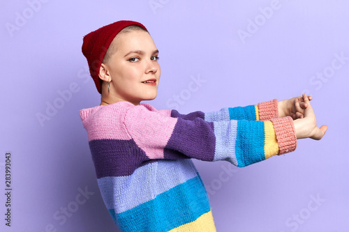 funny pleasant teen working out in the studio, interest, hobbby, pasttime photo