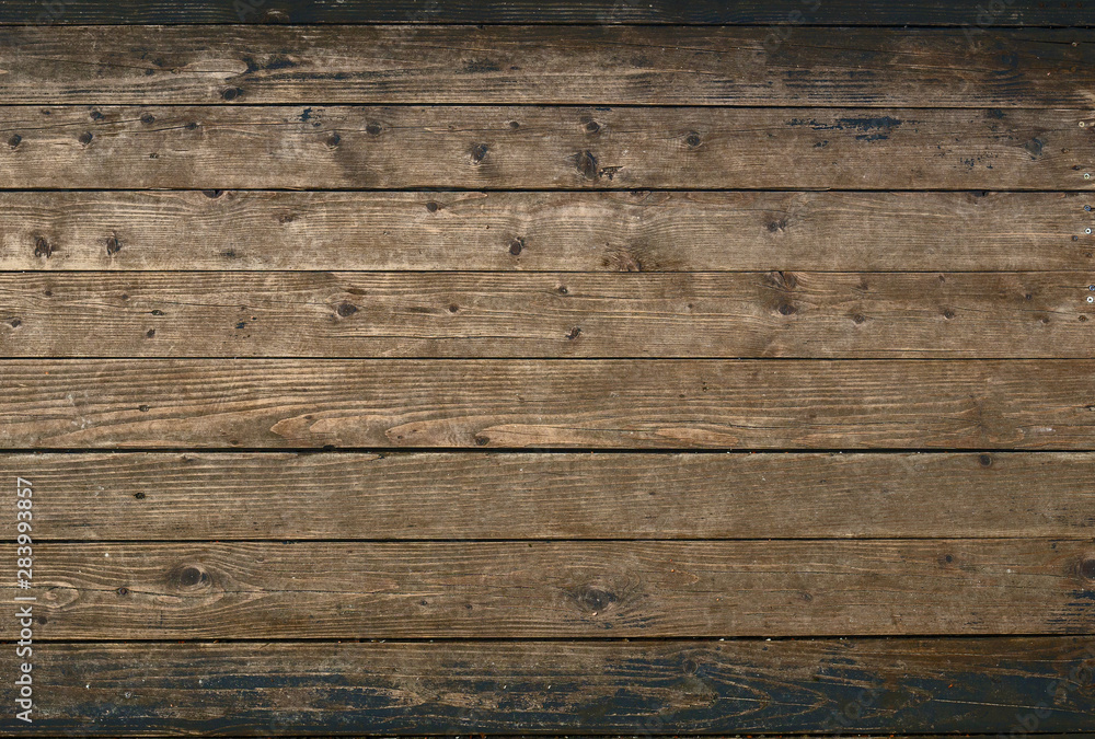 Texture of shabby wood, with multi-colored layers of paint. Close-up. Old background Texture of shabby wood, with multi-colored layers of paint. Close-up. Old background