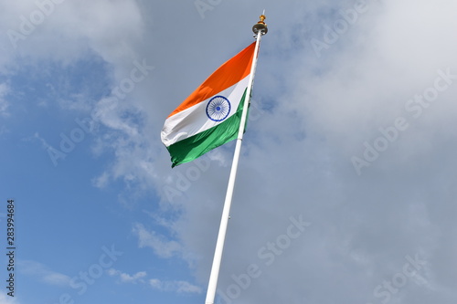 flags of India on background of blue sky