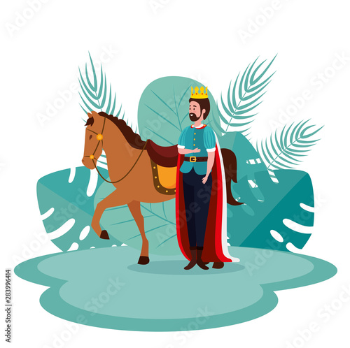 king with crown and cape with royal horse