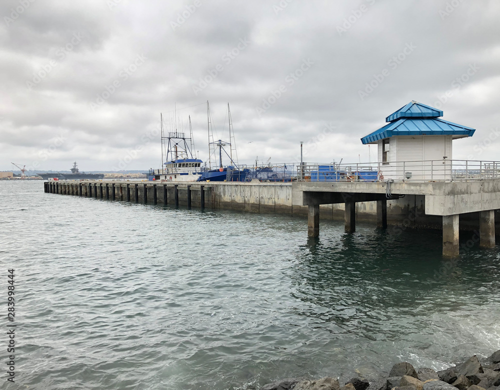 Boat pier in bay by San Diego