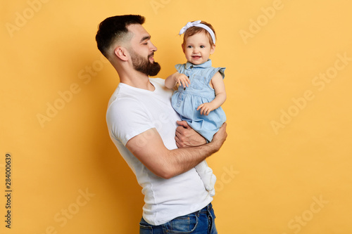 Εκτύπωση καμβά lovely beautiful sweet girl enjoying sitting on her daddy's hands