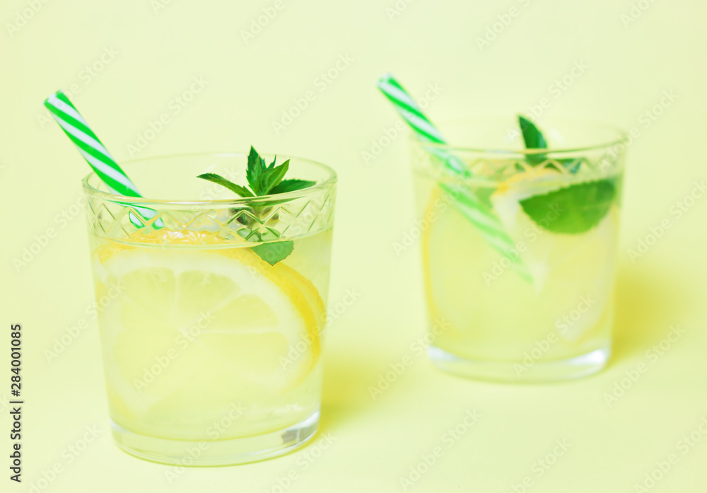 Lemonade or mojito cocktail with lemon and mint Lemonade or mojito cocktail with lemon and mint