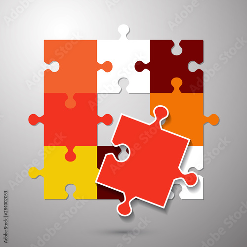 Abstract background from bright puzzle pieces. The composition is an unfinished puzzle.