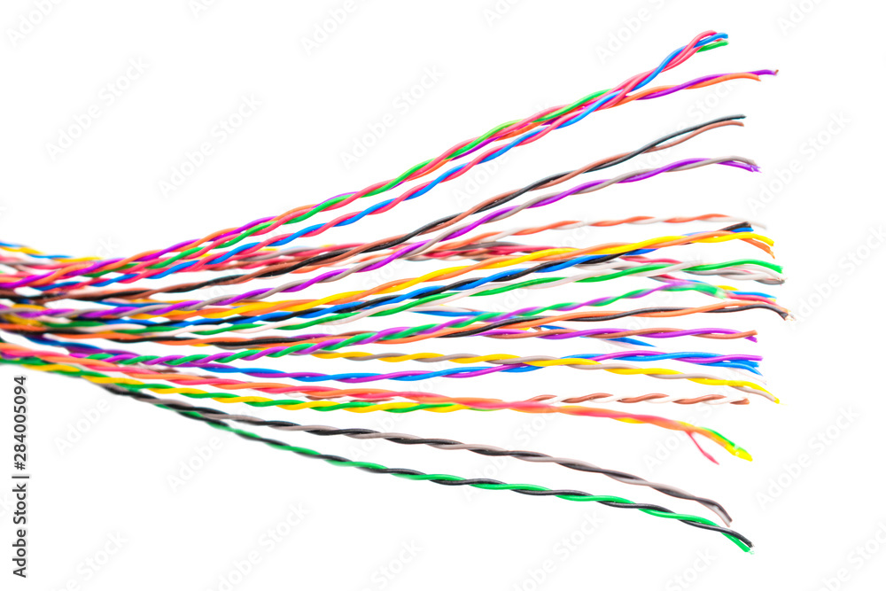 Multi-colored  electrical wires are on a white background. Telecommunication communication wires are intertwined. Thin colored telephone cable.