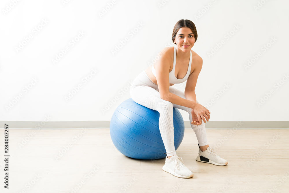 Naklejka premium Attractive Lady Relaxing During Fitness Training Workout
