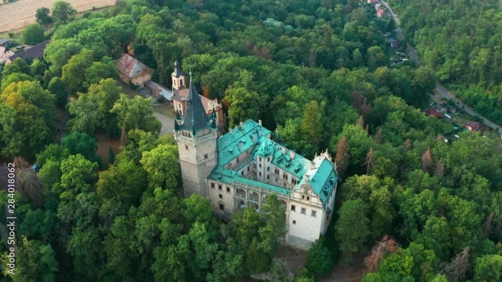 Aerial View of Old Castle in Green Wood With Old Bridge on the Background Aerial View of Old Castle in Green Wood With Old Bridge on the Background