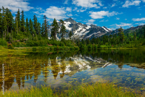 Picture Lake with Mt. Shuksan, Washington state. Picture Lake is the centerpiece of a strikingly beautiful landscape in the Heather Meadows area of the Mt. Baker-Snoqualmie National Forest. © LoweStock