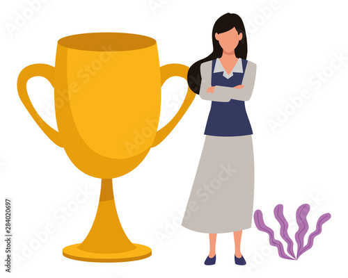 Executive businesswoman with big trophy cup