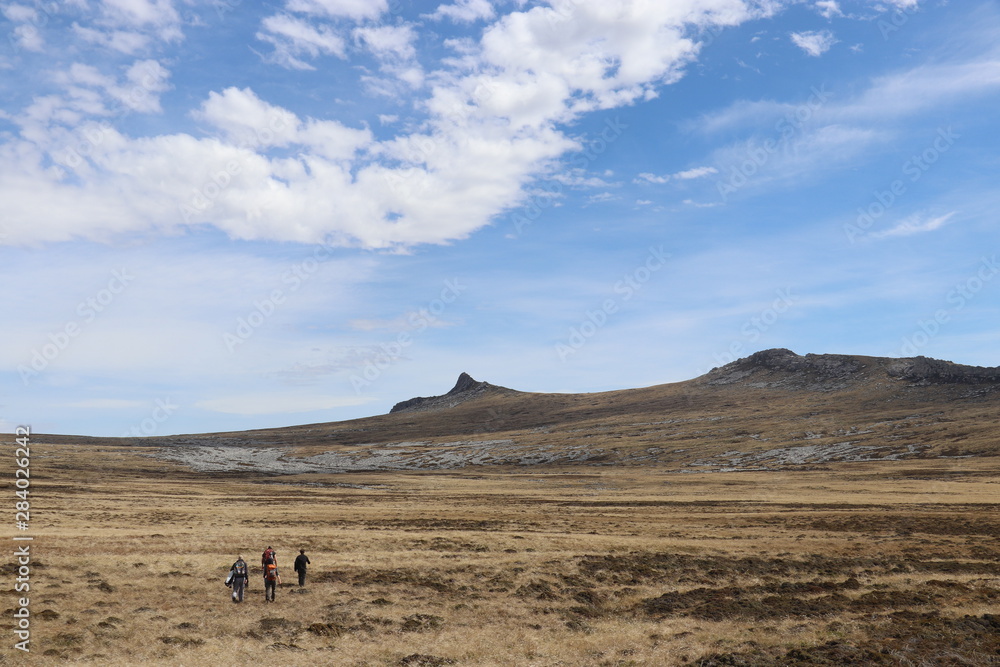 Two sisters mountain in the falklands with blue Skys and some cloud 
