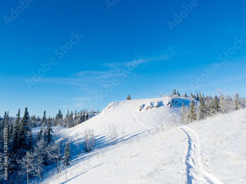 Snowy winter hills snowshoe track wonderland scene