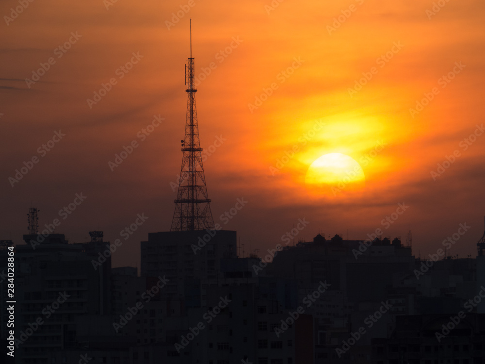 beautiful sunset and broadcast antenna
