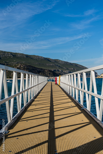 Pier pathway with white fence