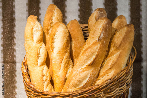bunch of French bread in a basket. 