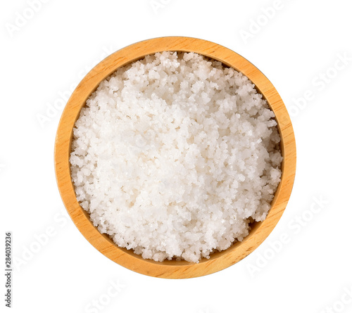 Salt in wood bowl on white background