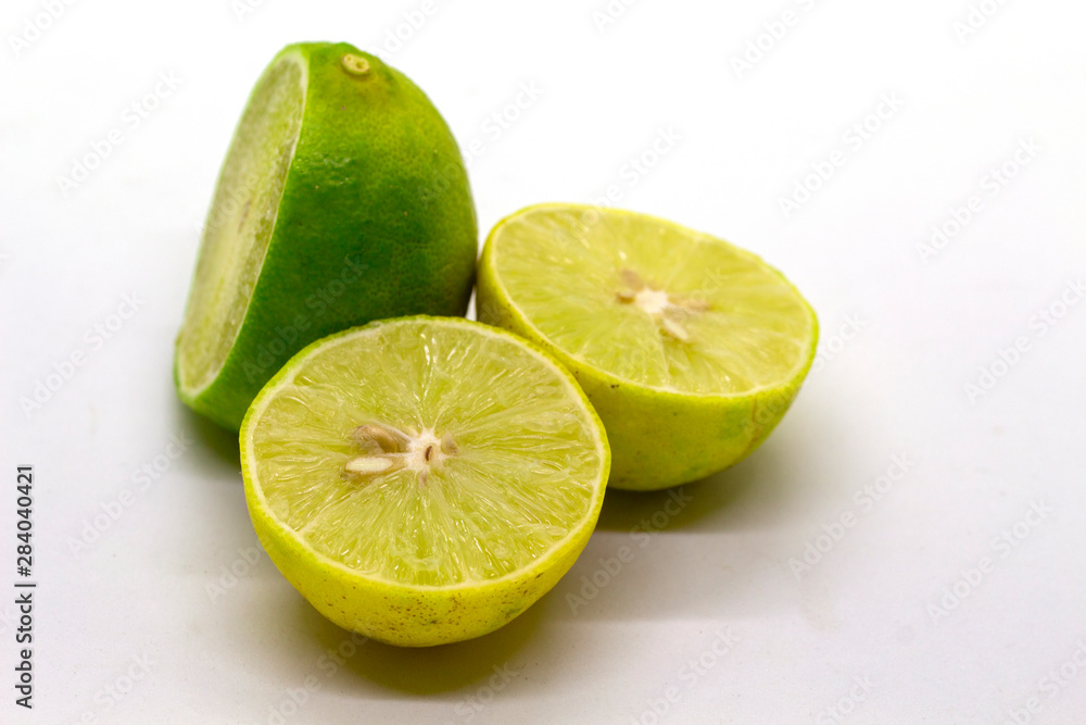 Lemon on a white background, sour fruit, cook in Asia like Tom Yum,universal food