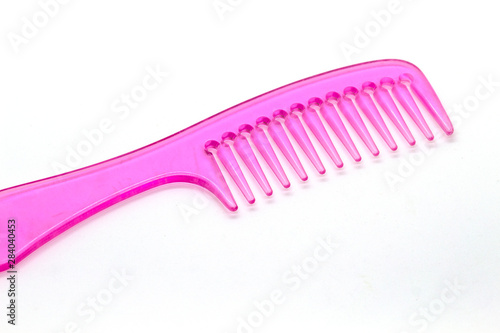Pink comb isolated white background