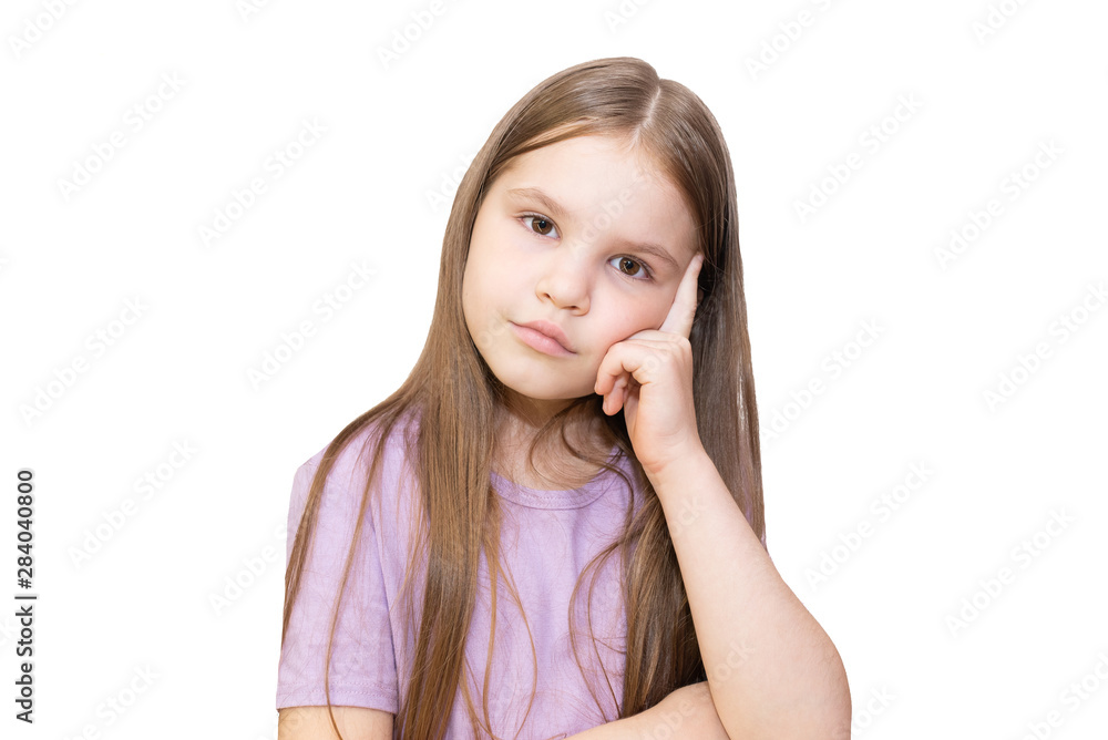 The little girl thoughtfully looks in a shot, propping up the head a hand. It is isolated on a white background. The little girl thoughtfully looks in a shot, propping up the head a hand. It is isolated on a white background.