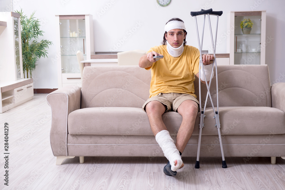 Young man after accident recovering at home Young man after accident recovering at home