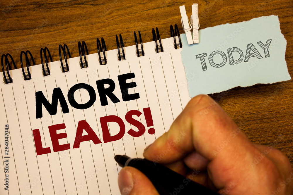 Text sign showing More Leads Motivational Call. Conceptual photo Give additional potential clients customersMan creating for today on notebook Hand hold holding pen Wooden background Text sign showing More Leads Motivational Call. Conceptual photo Give additional potential clients customersMan creating for today on notebook Hand hold holding pen Wooden background