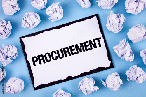 Word writing text Procurement. Business concept for Obtaining Procuring Something Purchase of equipment and supplies written White Sticky note paper within Paper Balls Plain Blue background. photo