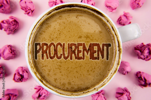 Writing note showing Procurement. Business photo showcasing Obtaining Procuring Something Purchase of equipment and supplies written Coffee in White Cup within Paper Balls plain background. photo