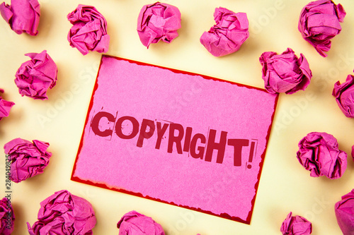 Writing note showing Copyright Motivational Call. Business photo showcasing Saying no to intellectual property piracy written Pink Sticky Note Paper plain background Pink Paper Balls.