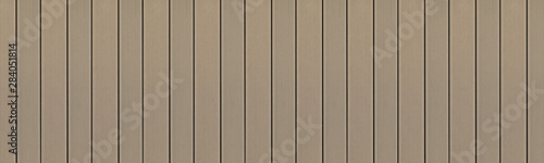 Top view of WPC in oak brown color. WPC: Wood-Plastic Composites are wood fiber and thermoplastic such as PE, PP, PVC, or PLA. A WPC decking are stylish and enrich the outdoor living