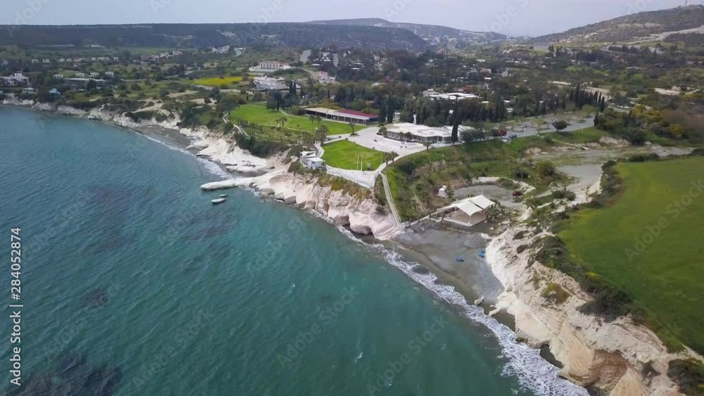 aerial shot of beautiful seashore with black sand beach, white cliffs and resort area aerial shot of beautiful seashore with black sand beach, white cliffs and resort area
