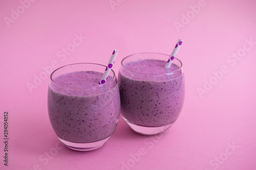 berry smoothie with paper tubes