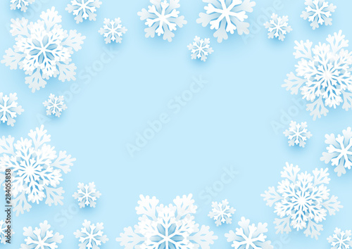 Christmas paper snowflakes on blue background for Your winter holiday design