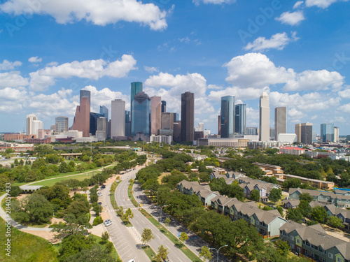 Aerial and panorama view of downtown Houston skyline in a beautiful day (with blue sky and white cloud) © duydophotography