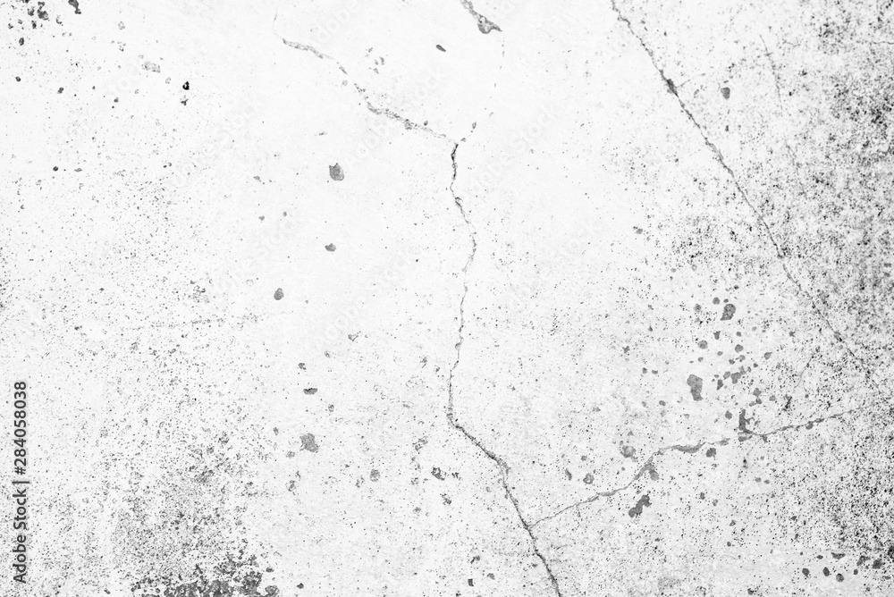 Texture of a concrete wall with cracks and scratches which can be used as a background Texture of a concrete wall with cracks and scratches which can be used as a background